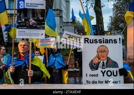 London, UK. 3rd Dec, 2023. Ukranians and Russians gather between Downing Street and the Ministry of Defence, in Westminster, to demand that Putin Stops The War and invasion of Ukraine. Credit: Guy Bell/Alamy Live News Stock Photo