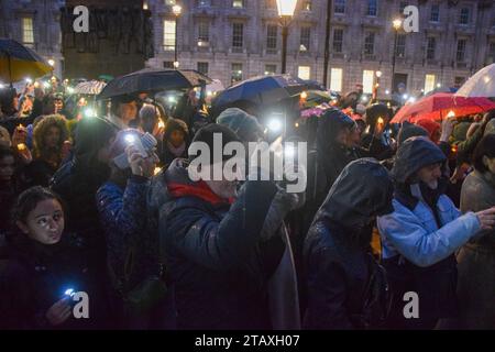London, UK. 3rd December 2023. People hold up lights during a vigil in Whitehall for lives lost on all sides during the Israel-Hamas war, and for peace. Credit: Vuk Valcic/Alamy Live News Stock Photo