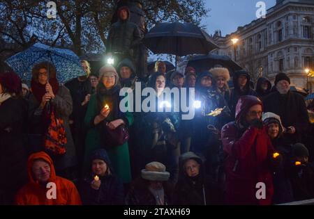 London, UK. 3rd December 2023. People hold up lights during a vigil in Whitehall for lives lost on all sides during the Israel-Hamas war, and for peace. Credit: Vuk Valcic/Alamy Live News Stock Photo