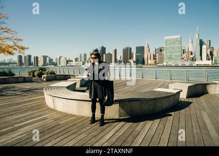 NEW YORK CITY - sep 12th 2022: View of Manhattan, New York, from Domino Park in Brooklyn. High quality photo Stock Photo