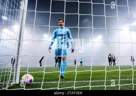 Augsburg, Germany. 03rd Dec, 2023. Soccer: Bundesliga, FC Augsburg - Eintracht Frankfurt, Matchday 13, WWK-Arena. Frankfurt goalkeeper Kevin Trapp reacts dissatisfied. Credit: Tom Weller/dpa - IMPORTANT NOTE: In accordance with the regulations of the DFL German Football League and the DFB German Football Association, it is prohibited to utilize or have utilized photographs taken in the stadium and/or of the match in the form of sequential images and/or video-like photo series./dpa/Alamy Live News Stock Photo