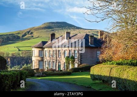 Crag Hall a country house east of the village of Wildboarclough, Cheshire, England and owned by the Earl of Derby with a view of Shutlingsloe hill Stock Photo