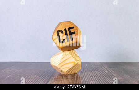 word CIF on wooden cubes, business concept. copy space Stock Photo
