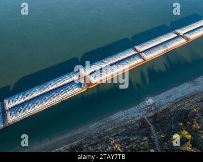 barges on the Ohio River at confluence with the Mississippi below Cairo, Illinois, aerial view Stock Photo