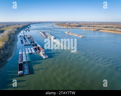 towboats and barges on the Ohio River above a confluence with the Mississippi at Cairo, Illinois, aerial view Stock Photo
