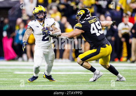 Iowa defensive lineman Ethan Hurkett 49 celebrates after