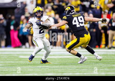 Iowa defensive lineman Ethan Hurkett 49 celebrates after