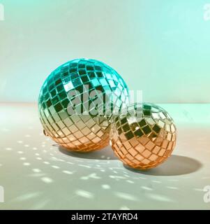 Two Pastel Green Disco Ball and Mirror Balls on a Green Background Stock Photo