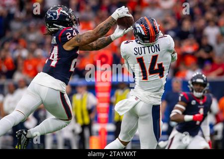 December 3, 2023: Houston Texans cornerback Derek Stingley Jr. (24) intercepts a pass intended for Denver Broncos wide receiver Courtland Sutton (14) during a game between the Denver Broncos and the Houston Texans in Houston, TX. Trask Smith/CSM Stock Photo