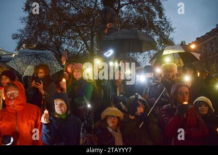London, UK. 3rd December 2023. People hold up lights during a vigil in Whitehall for lives lost on all sides during the Israel-Hamas war, and for peace. Credit: Vuk Valcic/Alamy Live News Stock Photo