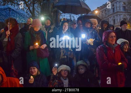 London, UK. 3rd December 2023. People hold up lights during a vigil in Whitehall for lives lost on all sides during the Israel-Hamas war, and for peace. Credit: Vuk Valcic/Alamy Live News Stock Photo