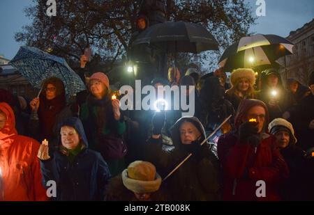London, UK. 3rd December 2023. People hold up lights during a vigil in Whitehall for lives lost on all sides during the Israel-Hamas war, and for peace. Credit: Vuk Valcic/Alamy Live News Stock Photo