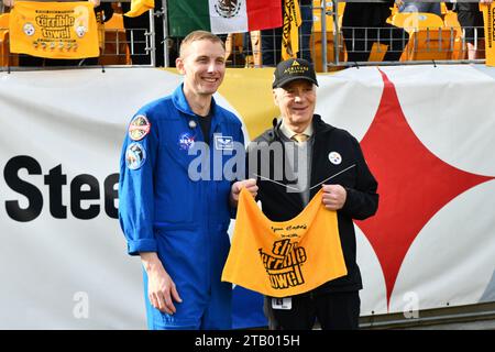 Pittsburgh, Pennsylvania, USA. 3rd Dec, 2023. December 3rd, 2023 NASA astronaut and Pittsburgh native Warren ""˜Woody' Hoburg with Pittsburgh Steelers owner, Art Rooney II holding a terrible towel that's been in space during pregame at Arizona Cardinals vs. Pittsburgh Steelers in Pittsburgh, PA. Jake Mysliwczyk/AMG Media (Credit Image: © Jake Mysliwczyk/BMR via ZUMA Press Wire) EDITORIAL USAGE ONLY! Not for Commercial USAGE! Stock Photo