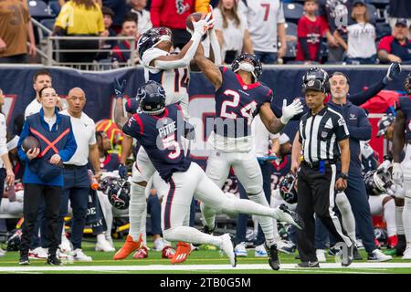 December 3, 2023: Houston Texans cornerback Derek Stingley Jr. (24) breaks up a pass intended for Denver Broncos wide receiver Courtland Sutton (14) during a game between the Denver Broncos and the Houston Texans in Houston, TX. Trask Smith/CSM (Credit Image: © Trask Smith/Cal Sport Media) Stock Photo