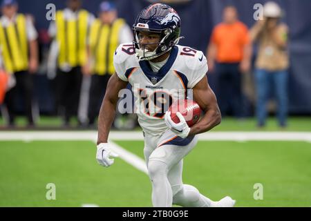 December 3, 2023: Denver Broncos wide receiver Marvin Mims Jr. (19) returns a kick during a game between the Denver Broncos and the Houston Texans in Houston, TX. Trask Smith/CSM Stock Photo