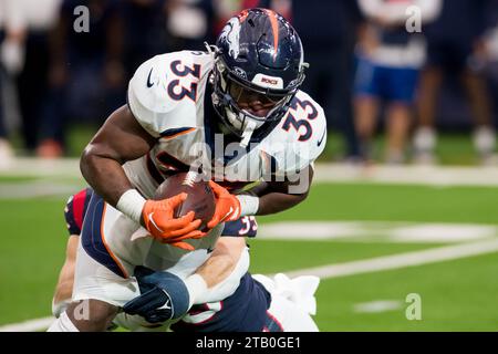 Houston, TX, USA. 3rd Dec, 2023. Denver Broncos running back Javonte Williams (33) carries the ball during a game between the Denver Broncos and the Houston Texans in Houston, TX. Trask Smith/CSM/Alamy Live News Stock Photo