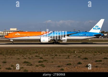 KLM - Royal Dutch Airlines Boeing 777-306-ER (Reg: PH-BVA) departing in the new updated Orange Pride scheme. Stock Photo