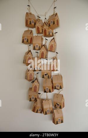 Christmas Advent Calendar made of cardboard against white background Stock Photo