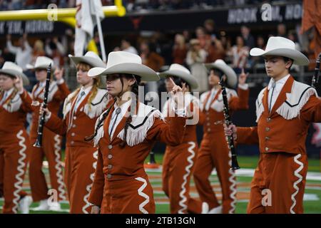 Arlington, Texas, USA. 2nd Dec, 2023. December 2, 2023, Arlington, Texas, United States: Members of the UT Austin March Band perform moments before the 2023 Dr Pepper Big 12 Championship game between Texas Longhorns and Oklahoma State Cowboys. on Saturday December 2, 2023 in Arlington, Texas, United States (Credit Image: © Javier Vicencio/eyepix via ZUMA Press Wire) EDITORIAL USAGE ONLY! Not for Commercial USAGE! Stock Photo