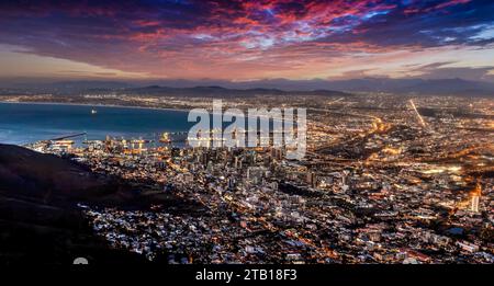 aerial view night Cape town, waterfront and the ocean, city lights are on Stock Photo