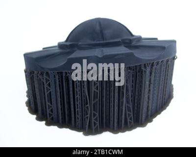 Black abstract object printed on 3D printer from photopolymer isolated on white background. SLA. Model 3D printed from liquid resins. Progressive additive 3D printer printing technology. Sla-printing. Stock Photo