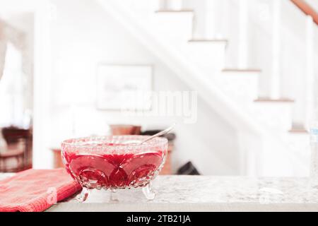 Cranberry Sauce in Glass Bowl on Counter Stock Photo