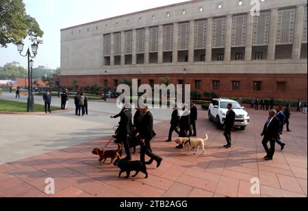 New Delhi, India. 04th Dec, 2023. Indian parliament security staff and sniffer dogs seen outside the new building of Parliament on the first day of the Parliament winter session 2023, at Parliament. Prime Minister Modi said the opposition should learn from defeat and consider this a golden opportunity and move forward with positivity this session. Credit: SOPA Images Limited/Alamy Live News Stock Photo