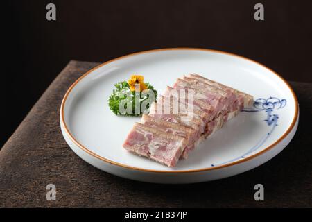 Chilled Crystal Ham，sliced pork terrine served with Zhenjiang black vinegal，Crystal Pork Trotter，Chilled crystal ham, or Jiangsu-style pork trotter a Stock Photo