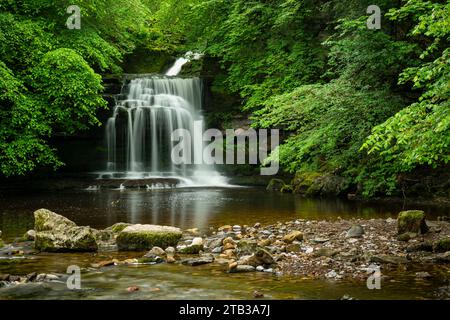 Cauldron Falls waterfall in the village of West Burton, Yorkshire Dales National Park, Yorkshire, England. Spring (June) 2022. Stock Photo