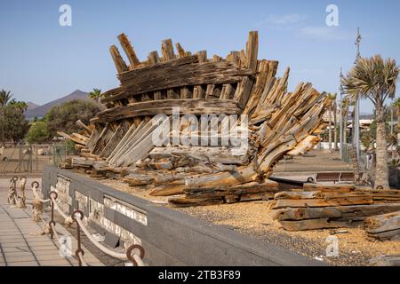 Old wooden ship wreck on display on the Arrecife sea front, Lanzarote, Canary Islands, Spain. Stock Photo