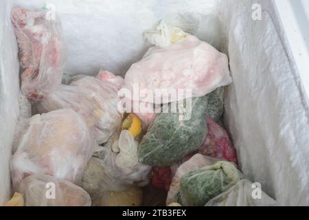 stack of food conserved in bad condition in freezer. harmful food for helth Stock Photo