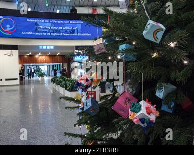 Vienna, Austria, Austria. 4th Dec, 2023. A Christmas tree in the middle of the Vienna International Center inside UN Vienna with a sign advertising ''International Day of Persons with Disabilities'' coined 'Nothing about Us Without Us'' focusing on life standards and qualities of people with disabilities.Various guests and speakers as well as a live concert was held for attendees. (Credit Image: © Bianca Otero/ZUMA Press Wire) EDITORIAL USAGE ONLY! Not for Commercial USAGE! Stock Photo