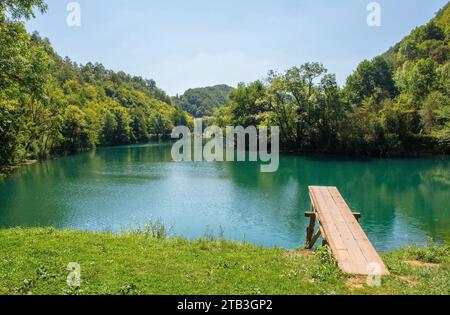 A wooden diving board on the River Una near Orasac, Bihac, in the Una National Park. Una-Sana Canton, Federation of Bosnia and Herzegovina. Early Sept Stock Photo