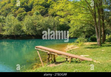 A wooden diving board on the River Una near Orasac, Bihac, in the Una National Park. Una-Sana Canton, Federation of Bosnia and Herzegovina. Early Sept Stock Photo