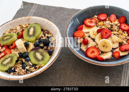 pair of acai ice cream bowls with fresh fruit. Stock Photo