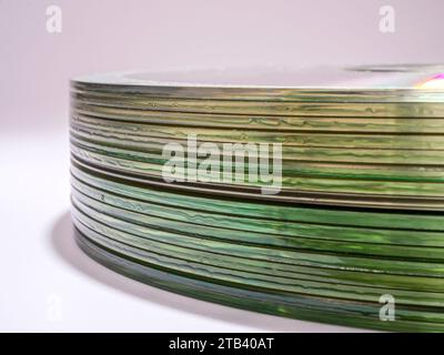 Stack of CDs. Macro photography from the side. Stock Photo