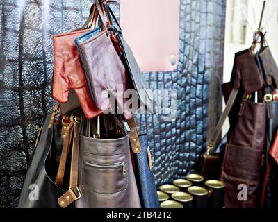 Leather aprons and mittens in the store Stock Photo