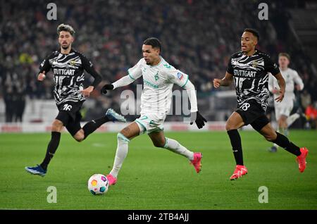 Justin Njinmah SV Werder Bremen SVW (17) on the ball in front of Atakan Karazor VfB Stuttgart (16) and Jamie Leweling VfB Stuttgart (18) MHPArena Stock Photo