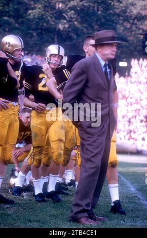 WEST POINT, NY - OCTOBER 4: Head coach Earl 'Red' Blaik, Pete Dawkins #24 and quarterback Joe Caldwell #12 of the Army Cadets stand on the sideline during an NCAA game against the Penn State Nittany Lions on October 4, 1958 at Michie Stadium in West Point, New York. The Cadets defeated the Nittany Lions 26-0. (Photo by Hy Peskin) *** Local Caption *** Earl Blaik;Pete Dawkins;Joe Caldwell Stock Photo