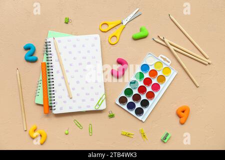 Composition with different school supplies on color background Stock Photo