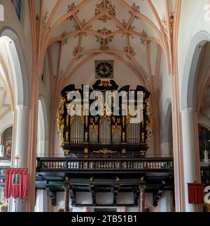 Mondsee, Upper Austria – AT – June 7, 2023 Interior view of the iconic organ in the St Michael parish church in Mondsee Stock Photo