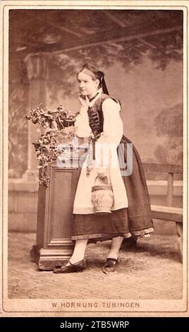 W Hornung - Junge Frau am Schränkchen, in Tracht, mit Krug (CdV). Stock Photo
