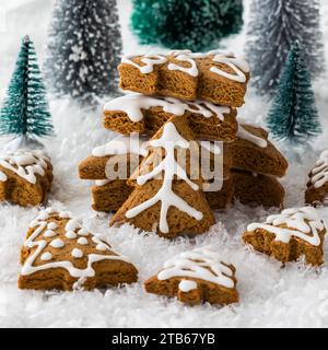 An arrangement of gingerbread cookies in the shape of trees, for the holidays. Stock Photo