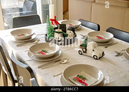 Table decorated for Christmas dinner Stock Photo