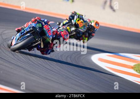 Cheste, Spain. 24th Nov, 2023. Fabio Quartararo of France and Monster Energy Yamaha MotoGP (Front) and Luca Marini of Italy and Mooney VR46 Racing Team (behind) rides during the Practice session of the MotoGP Gran Premio Motul de la Comunitat Valenciana at Ricardo Tormo Circuit (Cheste, Practice session of the MotoGP Gran Premio Motul de la Comunitat Valenciana). (Photo by Vicente Vidal Fernandez/SOPA Images/Sipa USA) Credit: Sipa USA/Alamy Live News Stock Photo