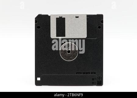 Floppy disk of 1.4 megabytes isolated on white background. Vintage storage for computer. Back side Stock Photo