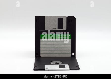 Floppy disk of 1.4 megabytes isolated on white background. Vintage storage for computer. Stock Photo