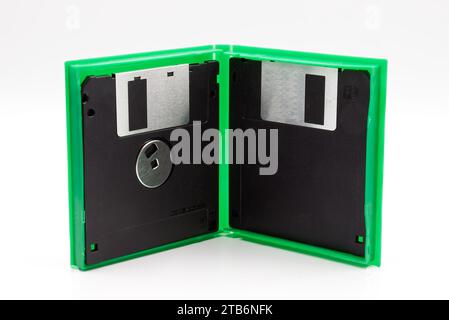 Floppy disk of 1.4 megabytes isolated on white background. Vintage storage for computer inside a box Stock Photo