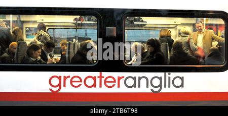 File photo dated 08/01/18 of commuters on board a Greater Anglia train at Shenfield in Essex. Strikes by train drivers will continue on Tuesday, causing more travel chaos in parts of England. Members of the train drivers' union Aslef at c2c and Greater Anglia will walk out, followed by strikes in the coming days at other train operators. Issue date: Tuesday December 5, 2023. Stock Photo