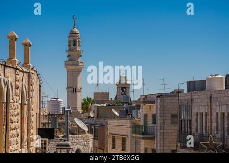 Bethlehem cityscape, West Bank, featuring the Minaret of the Mosque of Omar and the Church of the Nativity Stock Photo